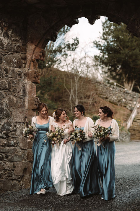 Bridal party wearing dusky blue bridesmaid dresses with white cardigans with bride in floral wedding dress for traditional castle wedding | blue bridesmaid dresses | classic wedding styling | Matthew Smith Photography Vintage Blue Bridesmaid Dresses, Deep Blue Bridesmaid Dresses, Dusky Blue Bridesmaid Dresses, Wedding Blue Bridesmaid Dresses, Bridesmaid Dress Inspiration, Blue Bridesmaid Dresses Short, Matthew Smith, Royal Blue Bridesmaids, Light Blue Bridesmaid Dresses