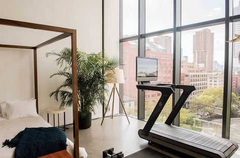 A treadmill in the corner of a bedroom Treadmill In Bedroom, Peloton Room Ideas, Workout Corner, Peloton Tread, Peloton Room, Gym Treadmill, Home Gym Essentials, Workout Room Home, Bedroom Gym