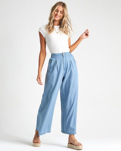 Big Trip Indigo - High Waisted Chambray Trousers - Style: S3PN04BIP0 The rebuttal to skinny jeans, the Big Trip brings back ready-to-play 90’s lines with a wide, cropped leg and high waist. Pleated at the front for added structure, the vintage-inspired wide leg denim is finished with a clean button closure. Wide Leg Crop Pants Outfit, Indigo Pants, Chambray Pants, Elephant Pants, California Outfits, Trousers For Women, Chambray Fabric, Faded Denim, Trouser Style