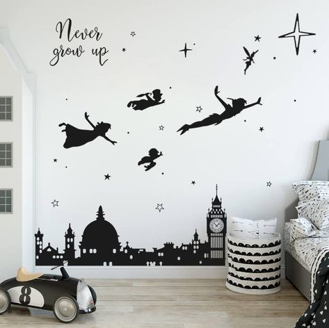 PRICES MAY VARY. Black Peter Pan theme wall art stickers, elements include Peter Pan and his friends, quotes "Never grow up", and cityscape silhouettes including London Eye and Big Ben, cool wall decoration for your room. Material: Vinyl. Non-toxic, environmental protection, waterproof. Easy to apply, remove and reuse without leaving damage or residue. Very easy to assemble and great focal point in your kids room, living room, play room, children's room, baby girls and boys room. It can be stuck Pan Tattoo, Kids Bedroom Wall Decor, Peter Pan Nursery, Big Ben Clock, Sticker Baby, Kids Bedroom Walls, Star Wall Decals, Disney Rooms, Deco Stickers