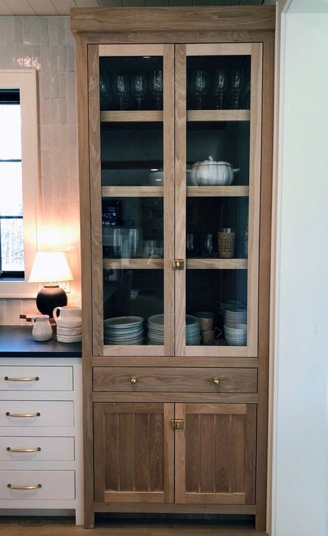 This is a gorgeous solid white oak kitchen hutch that was built in our shop for one of our clients. We are able to replicate this piece or modify the design to your liking. It has solid white oak shelves, three up top and one in the lower cabinet. The hardware is not included except for the soft close hinges, and soft close undermount drawer slides. The drawer is made of solid white oak all dovetail construction. The finish is a distressed, white pickling that has been scraped and finished in a Built In Kitchen Hutch, Built In China Cabinet, Storage Hutch, White Oak Kitchen, Built In Hutch, Oak Kitchen Cabinets, Twin Lakes, China Cabinets, Oak Kitchen