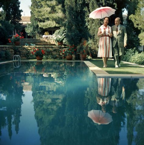 Dimitris Levidis with his wife in the garden of their villa at Harvati, near Athens, Greece. 1961 Slim Aarons Photography, Slim Aarons Photos, Slim Aarons Prints, Greek Garden, Photographers Gallery, Slim Aarons, Old Money Aesthetic, Attractive People, Look Vintage