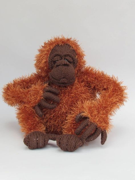 One of my all time favourites: Orangutan Soft Toy Knitting Pattern https://etsy.me/3tjStQT #knitting #orangutan #orangutanteacosy #ape #monkey #softtoy #plush #doll #jungle #TeaCosyFolk Orangutan Crochet, Tea Pot Cover, Tea Cosy Knitting Pattern, Ape Monkey, Pot Cover, Cozy Crochet, Tea Cosy, Dk Yarn, Knitted Toys