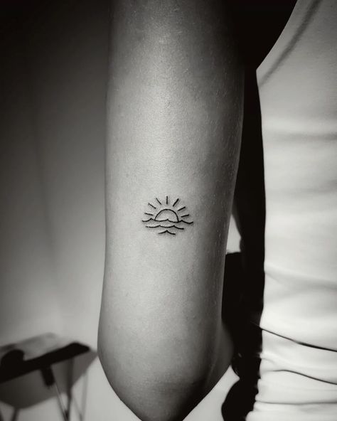 Capturing Nature's Harmony: Explore the Symbolism of Wave and Sun Tattoos in Our Latest Blog. Dive into Tranquility and Renewal. Sun Always Rises Tattoo, Sun Water Tattoo Design, Sunrise Over Waves Tattoo, Wave Sun Tattoo Simple, Small Tattoo Ideas Nature, Sun And Wave Tattoo Ankle, Sunset And Waves Tattoo, Sun Horizon Tattoo, Lake Life Tattoo