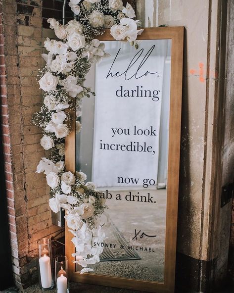 A simple yet fun way to greet your wedding guests is with this incredible wooden frame welcome wedding mirror sign. You can play around with fonts, like this couple chose to use four different fonts in black writing. Tie everything together with white florals and pillar candles for a rustic meets minimalist wedding. Head to the link for more ways you can use mirror signs at your wedding. // Photo: MLE Pictures, Planner: Sara Rae Design + House of Catherine, and Florals: RAM Floral Mirror Wedding Signs, Cer Nocturn, Wedding Entrance Sign, Wedding Bathroom, Wedding Mirror, Cricut Wedding, Unique Wedding Flowers, Mirror Sign, Wedding Entrance