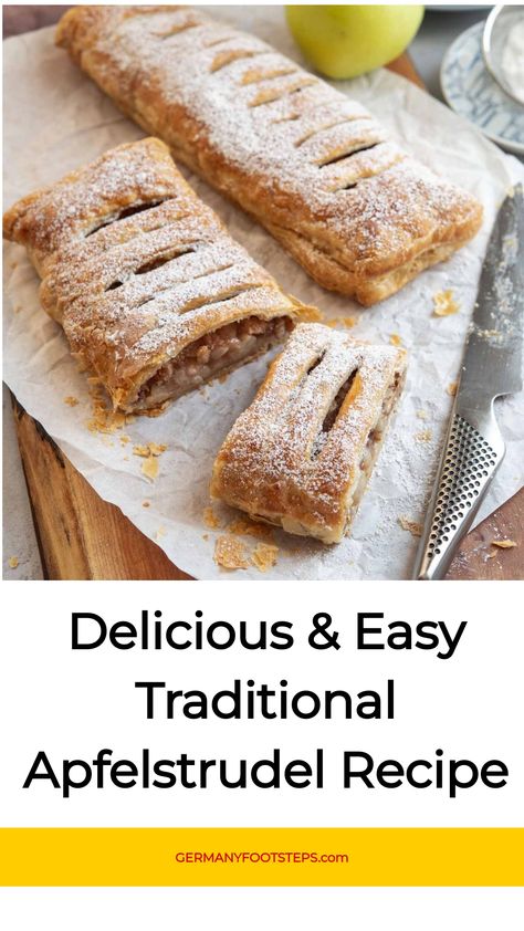 Applestrudel with powdered sugar on parchment paper alongside a knife. Puff Pastry Apple Strudel, Authentic Apple Strudel Recipe, Strudel Recipes Germany, Apple Strudel Puff Pastry, Apfelstrudel Recipe, German Apple Strudel, German Recipes Dinner, Slow Cooker Red Cabbage, Easy Apple Strudel Recipe