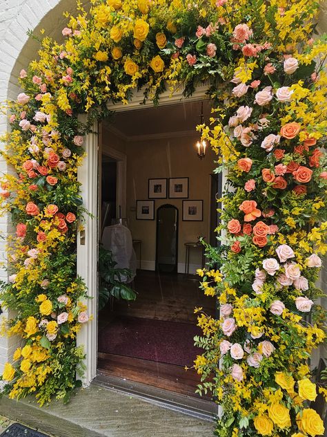 bright yellow and orange flower archway, wedding decor, party decor, baby shower decor Yellow Orange Pink Wedding, Haldi Entrance, Archway Wedding, Yellow Party Decorations, Flower Archway, Spanish Flowers, Orange Wedding Decorations, Orange And Pink Wedding, Mandir Decoration