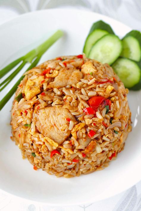 Learn how to make Thai Fried Rice (Khao Pad) the authentic way like they do in Thailand and at Thai restaurants! It’s quick and easy to make in under 30 minutes, high in protein thanks to chicken and eggs, and full the BEST spicy, savory and sweet flavors! Perfect for busy weeknights and better than takeout! #thaifood #friedrice #dinner #stirfry #mealprep #thairecipes #highproteinmeals #highprotein #onewokwonder #easyrecipes | That Spicy Chick Thai Spicy Fried Rice, Thai Express General Thai Chicken, Traditional Thai Recipes, Thai Fried Rice Recipe Authentic, Spicy Chicken Fried Rice Recipe, Thailand Food Recipes, Thai Rice Recipes, Thai Fried Rice Recipe, Fried Rice Thai