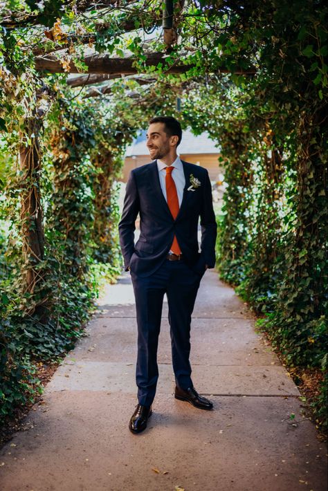 Navy Blue Suit With Burnt Orange Tie, Black Suit With Burnt Orange Accents, Groomsmen Attire Navy Blue And Burnt Orange, Groom Burnt Orange, Navy Suit Burnt Orange Tie, Navy Blue Groomsmen Suits Burnt Orange, Black Suit Burnt Orange Tie, Navy Suit Orange Tie, Black Suit Orange Tie