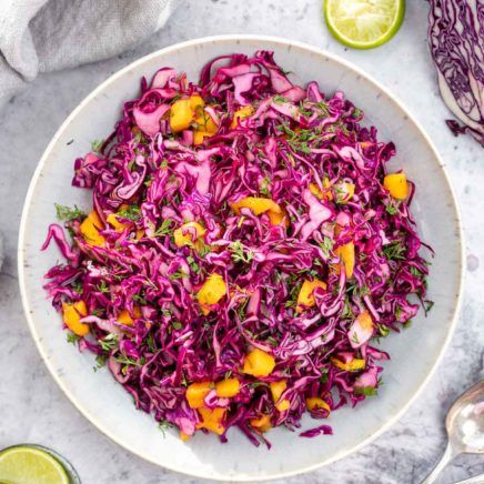 Red Cabbage Mango Slaw Mango Slaw, Red Cabbage Salad, Red Cabbage Slaw, Lime Recipes, Vegetarian Cabbage, Mango Recipes, Mango Salad, Cabbage Slaw, Cabbage Salad