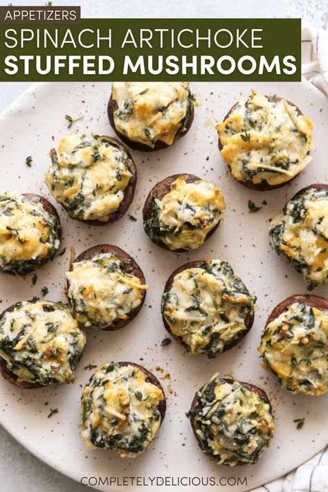 Spinach-Artichoke Stuffed Mushrooms Stuffed Appetizers, Spinach Artichoke Stuffed Mushrooms, Stuffed Mushrooms With Cream Cheese, Parmesan Artichoke, Stuffed Mushroom Recipes, Cream Cheese Stuffed Mushrooms, Italian Stuffed Mushrooms, Party Food Dishes, Mushroom Appetizer