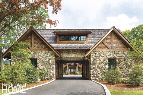 The driveway leads through a combined garage and guesthouse in the manner of a dogtrot, ending in a courtyard formed by the main house and its garages. House With Bridge To Garage, End Of Driveway Ideas Entrance, Adirondack Lodge, Garage Pictures, Adirondack Style, New England Farmhouse, New England Home, Porte Cochere, Exclamation Point