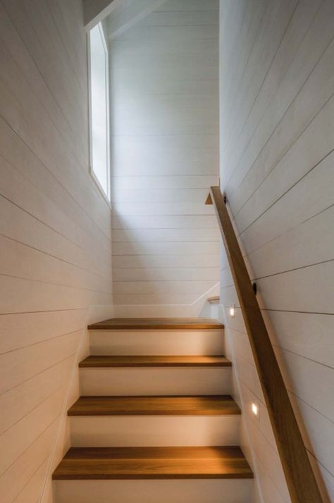 Shingled beach cottage in Martha’s Vineyard with modern elements Finished Stairs To Basement, Barndominium Stairs, Hutker Architects, Stairs Handrail, Enclosed Staircase, White Staircase, Basement Stairs, Country Cottage Decor, Metal Barn