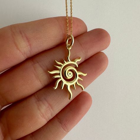 Spiral Sun Necklace, Little Sun Charm, 925 Sterling Silver Minimal Glowing Sun Pendant, Hippie Jewelry, Celestial Necklace, Gift for Her Little Sun Charm is going to brighten your day while completing your outfit ☀️ Product Details, - Carefully produced with High Quality 925k Sterling Silver - 14k Gold Plated - Height of the pendant: 2.2 cm (0.83 inches) - Chain Length is optional; 45 cm or 55 cm, and also you can order the pendant with no chain - Unique and delicate design ✈️✈️✈️ EXPRESS & FREE SHIPPING ✈️✈️✈️ - All items come in nicely packaged beautiful jewelry boxes ready to gift - All of our jewelry are hypoallergenic. For long term use, it should be protected from chemical products such as detergents, bleach, perfume. BEST GIFT FOR THE LOVELY ONES ♥️ Feel free to contact us for any q Sunburst Necklace Gold, Sun Themed Accessories, Evil Eye Gifts, Sun Necklace Silver, Sun Necklaces, Sun Choker, Sun Accessories, Spiral Sun, Sun Jewelry