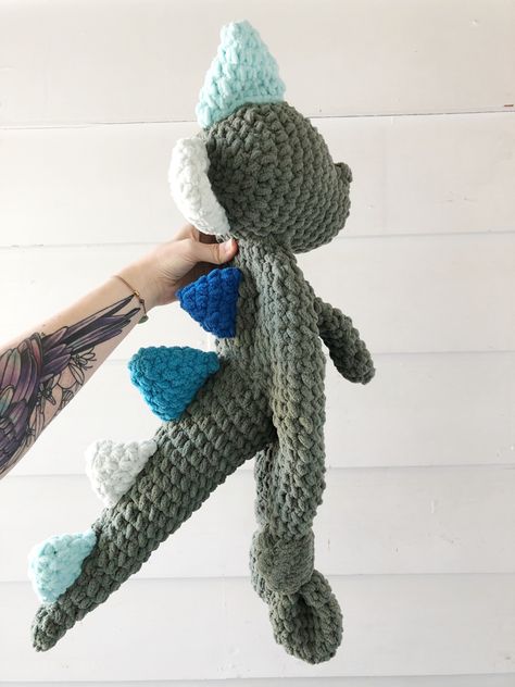 Meet “Dax the dino” - an unstuffed keepsake dino cuddler Dinosaur Lovey, Giraffe Lovey, Lovey Crochet, Crochet Lion, Toddler Boy Gifts, Making New Friends, Crochet Dinosaur, Chenille Yarn, Baby Lovey