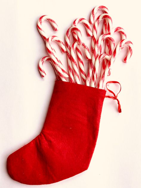 A stocking filled with candy canes sitting on top of a table photo – Free Christmas Image on Unsplash Christmas Image, Candy Ornaments, Baby Images, Background Images Hd, Forest Wallpaper, Wood Wallpaper, Christmas Gift Decorations, Photo Christmas, Yellow Wallpaper