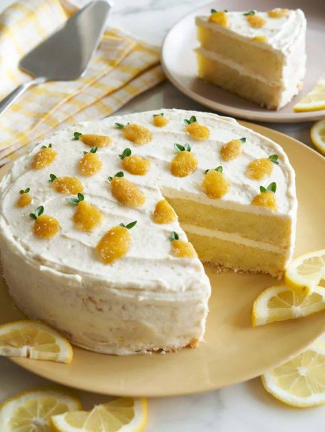 Our Lemon Thyme Layer Cake is perfect for a celebration. Serve our Lemon Cake recipe as single layers with frosting on top for a more casual presentation. We love the bright lemon taste in this recipe along with the hint of thyme. It's a crowd pleasing cake for sure! | cake recipes | dessert recipes | summer desserts | Lemon Thyme Cake, Thyme Cake, Cake Varieties, Candied Lemon Peel, Lemon Layer Cakes, Lemon Frosting, Lime Recipes, Lemon Thyme, Layer Cake Recipes