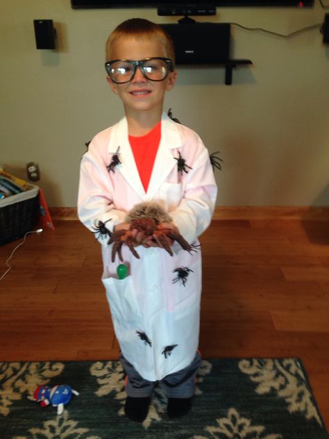 Spider scientist Halloween costume....super easy!  Child size lab coat (Amazon.com), wiggly spiders (also amazon.com), safety pins, nerd glasses ( Halloween store). Scientist Halloween Costume, Mad Scientist Costume, Scientist Costume, Children Costumes, Spiderman Costume, Nerd Glasses, Halloween Store, Safety Pins, Mad Scientist