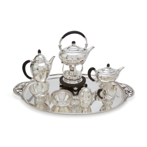 An Assembled Eight-Piece Danish Silver Tea and Coffee Set, Georg Jensen Silversmithy, Copenhagen, 20th century | Dining IN | New York2021 | Sotheby's Silver Tea Set Display, Tea Set Display, Silver Tea Service, Silver Tea Set, Silver Teapot, Coffee Service, Tea And Coffee, Silver Tea, Tee Set