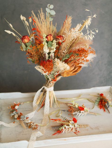 Orange autumn wedding bouquet and buttonholes, dried flower crown on larger international orders (3+ items) discount is available RUSH MY ORDER is an extra fee to dispatch one item within 3 days, ONLY purchase with another actual item I make all of my HANDTIED bouquets and wedding flowers in my seaside home in East Sussex Send a message if you need some other items in this colour scheme usually I can make pretty much anything with my years of experience in wedding flowers ;) most of these flower Dry Flower Wedding, Handtied Bouquets, Autumn Wedding Bouquet, Large Wedding Bouquet, Cream Wedding Flowers, Rustic Flower Arrangements, Buttonhole Flowers, Dried Flower Crown, Eucalyptus Flower