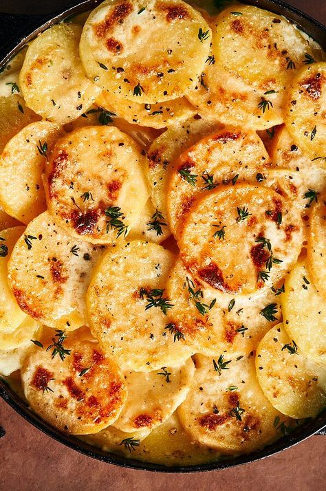 This recipe for a three-root gratin is reinvigorated by a hearty combination of rutabaga and celery root.#foodandwine #christmas #christmasrecipes #christmasmeal #holidays #holidayrecipes Root Vegetable Gratin, Fall Casseroles, Potato Gratin Recipe, Tartiflette Recipe, Celery Root, Potato Gratin, Holiday Side Dishes, Scalloped Potatoes, Potato Dishes