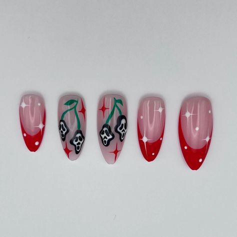 Halloween but make it  girly  Scream inspired cherry nails. 2 accent nails featuring scream mask cherries and red sparkles. Complimentary French tips with white sparkles complete this super cute halloween design. This design is fully customisable, select your perfect base colour and desired French tip colour (red, green or white) to create your perfect halloween nails. base colour in photos is shade 6 DISCLAIMER! nails are hand painted to design and colours may differ may photos Ghostface Cherry Nails, How To Do Cherry Nails, Ghost Face Cherry Nails, Cherry Red Halloween Nails, Skull Cherry Nails, Halloween Nails 2024 Trends, French Tip Colour, Halloween French Tips, 2 Accent Nails