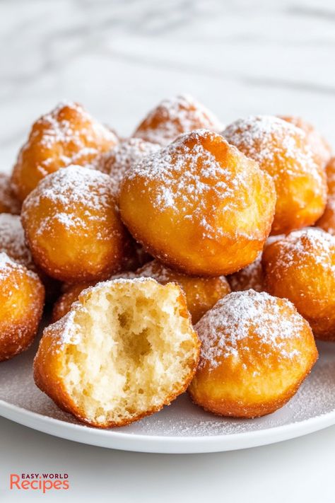 Easy Zeppole (Italian Donuts) Recipe - EasyWorldRecipes Italian Donuts, Italian Main Dishes, Italian Snacks, Italian Desserts Traditional, Italian Christmas Recipes, Easy Donut Recipe, Christmas Cookie Recipes Holiday, Italian Recipes Dessert, Dessert Spread