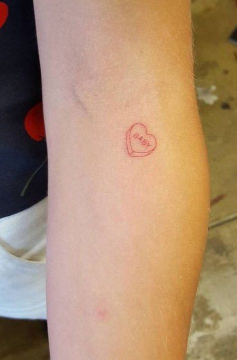 Heart Candy Tattoo, Conversation Heart Tattoo, Baby Tattoo Ideas, Tattoos Baddie, Tattoo Red Ink, Baddie Tattoos, Small Colorful Tattoos, Candy Tattoo, Tattoo Baby