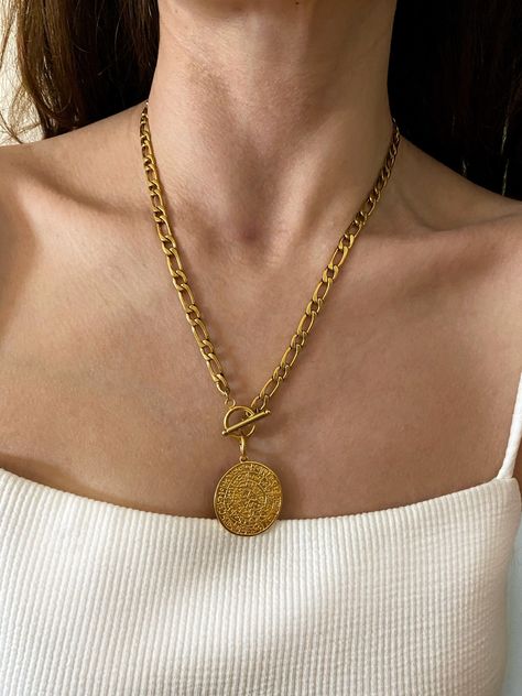 Excited to share this item from my #etsy shop: Gold coin necklace, phestos disc pendentif medallion, chunky coin necklace, ancient aesthetic coin charm necklace, Greek coin charm necklace Ancient Aesthetic, Figaro Necklace, Gold Coin Necklace, Greek Coins, Coin Pendant Necklace, Figaro Chain, Gold Coin, Coin Necklace, Coin Pendant