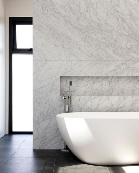 Fabulous Carrara Marble feature wall in this beautiful ensuite. 📷 @rachellewisphotography  #cdkstone #carrara #marble #carraramarble #naturalstone #naturalbeauty #naturesmasterpiece #designinspiration #dreams #lithofin #bathroomdesign #bathroominsp Carrara Marble Bathroom Floor, Bathroom Floor Decor, Marble Feature Wall, Carrara Bathroom, Bathrooms Floors, Carrara Marble Bathroom, Natural Stone Bathroom, Cheap Living Room Sets, Marble Bathroom Floor