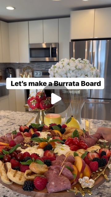 Reina G. Slim on Instagram: "Burrata Charcuterie Board 🤤 What you will need 👇🏻  Charcuterie cheese boards are always my fav and go-to especially when entertaining! They are the perfect snack/appetizer for any party. Easy to make and fun to put together using different seasonal veggies and fruits. Always a hit when hosting!   Ingredients:  ▫️Burrata cheese balls ▫️Cherry tomatoes ( Mixed color)  ▫️Crackers/bread (I used mini naan crackers, wheat crackers, toasted garlic bread and grilled crostini)  ▫️Fruit: Strawberries, peaches, raspberries and blackberries (We can use whatever fruits you like) ▫️Nuts: Pecans, pistachio, almonds and cashews (I used pecans and pistachio)  ▫️Basil ▫️Salami  ▫️Olive oil   Follow along to see how I’ve put this board together. Happy to answer your questions Charcuterie Board With Burrata, Burrata Charcuterie Board, Fruit And Nut Charcuterie Board Ideas, Fruit And Cracker Charcuterie Board, Grilled Crostini, Ultimate Burrata Board, Fruit Cheese And Cracker Charcuterie Board, Burrata Board, Mini Naan