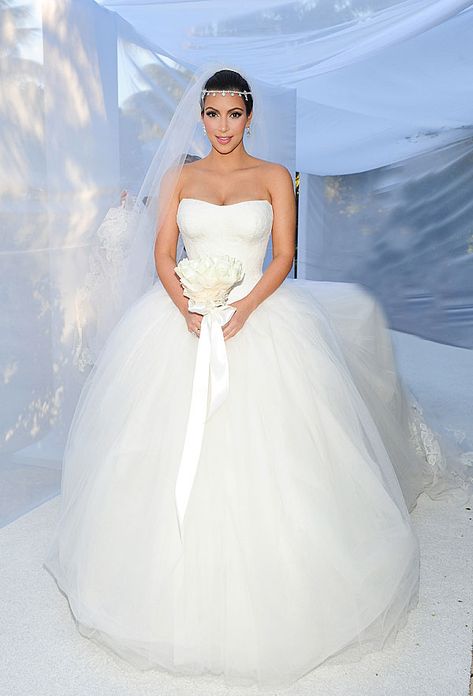 Startraks  -Cosmopolitan.com For Authentic Vintage Wedding Jewelry go to: https://www.etsy.com/shop/ButterflyEffectInc Kardashian Wedding Dress, Kim Kardashian Wedding Dress, Famous Wedding Dress Designers, Kardashian Wedding, Kim Kardashian Wedding, Celebrity Bride, Silver Cocktail Dress, Celebrity Wedding Dresses, Wedding Dresses Vera Wang