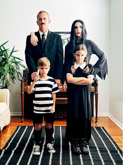 Family wearing Addams Family Halloween costumes Adam’s Family Costumes, Adam Family Costume, Adams Family Halloween Costumes, Adams Family Costume, Diy Family Halloween Costumes, Addams Family Halloween Costumes, Addams Family Costume, Family Halloween Ideas, Olaf Costume