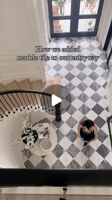 Annie Mescall on Instagram: "How we added this beautiful checkered pattern marble flooring to our entryway! By we, I mean the talented contractors. We add all the original wood removed because we wanted the tile to lay evenly with the wood flooring when it met other rooms. It took a day to remove the wood and to sand down the concrete from the wood glue and application. One thing we did ask the contractor to do was to try his best to lay the tile pattern in the same path. The flooring is a matte finished grey and white marble. In total it took 3 days and cost us $1,200 to the labor and $4,600 for the tile. ⭐️ Tile is from @riadtile 12x12!  Casablanca Carrara & Bardiglio Grey Marble – Honed – 12″x12″ Checkerboard Bundle #tile #checkeredfloor #diyproject #texashomes #marblefloors" Checkered Floor With Rug, Checkered Marble Floor Entryway, Grey Checkered Kitchen Floor, Checkerboard Tile Entryway, Entryway Checkered Floor, Checkerboard Floor Hallway, Black And White Harlequin Floors, Checkerboard Floor Entryway, Checkered Floor Foyer