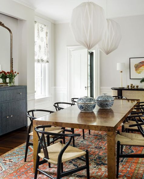 Black Wishbone Dining Chairs, Modern Greek Revival Home, Wishbone Dining Chairs, Marble Top Kitchen Island, Charming Dining Room, Blue Vintage Rug, Greek Revival Home, French Dining Chairs, Transitional Dining Room