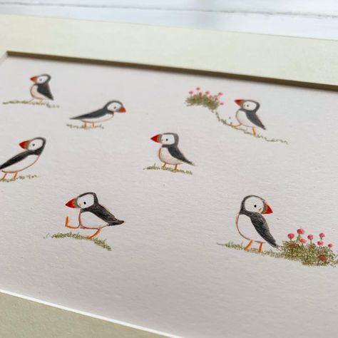 This little family of puffins will be flying over to Germany shortly! I really enjoy making these tiny wildlife pieces. So far I’ve made puffins (obvs), swifts, lapwings, hares and goldfinches. What shall I do next? 🤔 . #originalart #puffins #birdart #illustrator #animalart #illustrations #scottishwildlife #seathrift #sararhys Goose Pottery, Puffin Illustration, Puffin Painting, Fly Drawing, Tiny Art, Watercolour Inspiration, Little Family, Animation Design, Animal Illustration