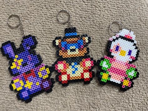 Request any character from the newest addition in the FNAF franchise, Security Breach! Fnaf Perler Beads, Security Breach, Perler Bead Art, Beaded Keychains, Perler Beads, Bead Art, Keychains, Beads, Memes