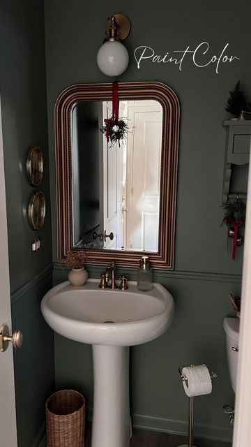 ashley | home decor on Instagram: "I used the color Dried Thyme by Sherwin Williams in our powder room. Emerald Satin for the walls and Pro Classic Satin for the trim. Make sure to save for later if you would use this color! ✨Comment “LINK” for my powder room decor links. All of the details for this project are saved to my Powder Room highlight. Make sure you are following me first or Instagram may filter the message! home decor | green bathroom | small bathroom | powder room decor | vintage modern bathroom | bathroom makeover #powderroom #powderroomdesign #homediy #mycrumbshome #hunkerhome #ambularinteriorsaintgotnothingonme #greenbathroom #ballarddesigns #amazonfinds #amazonmusthaves #amazonhomefinds #amazonhomedecor #amazonhome #homedecor #homedesign #interiordesign #interiordesign Green Powder Room, Vintage Modern Bathroom, Powder Room Paint, Bathroom Powder Room, Home Decor Green, Room Decor Vintage, Guest Bedroom Design, Powder Room Decor, Ashley Home