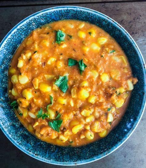 Fresh and juicy sweet corn gets dunked in rich and creamy curry flavored   with warm Indian spices. Enjoy this creamy corn curry with rice or   roti. Full recipe on kitchendocs.com #recipes #easyrecipe #corn #curry   #vegetarian #indianfood Corn Curry, Curry With Rice, Creamy Curry, Creamy Corn, Global Cuisine, Gujarati Recipes, Fusion Food, Global Recipes, Cuisine Recipes