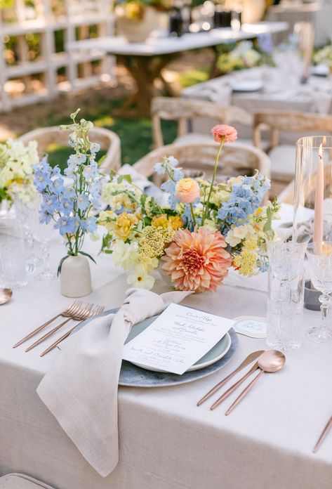 Wedding Summer Florals, Summer Flower Wedding Centerpieces, Light Pastel Wedding Theme, Wedding Table Floral Runner, Bridal Shower Table Setting Simple, Summer Bud Vases Wedding, Pastel Color Wedding Theme Table Settings, Peach And Blue Centerpieces, Bright Wedding Table Decorations