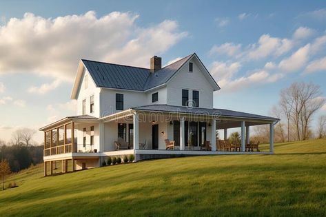 Modern farmhouse, with wrap-around porch and swing, overlooking peaceful country landscape royalty free stock images Southern Wrap Around Porch, Wrap Around Porch And Balcony, Rap Around Porch, Wrap Around Porch Ideas, Farmhouse With Wrap Around Porch, 2 Storey House Design, 2 Storey House, Dream Future, Country Landscape