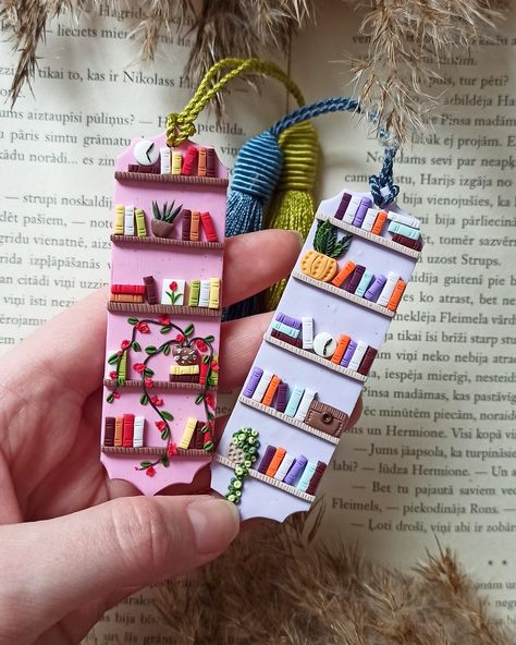 📚✨ Elevate your reading experience with our adorable bookmark set! 🌸 This set of two features charming designs in pink and light purple, adorned with tiny books, plants, clocks, and tassels. 🌿 Keep your place in style and add a touch of whimsy to your reading adventures! 💖 . . . #Bookworm #ReadingGoals #bookmarklove #handmadejewelry #dāvana #librariesofinstagram #bookwormgifts #bookaddict #bookstagrammer #bookworm #avelli_handmade #polymerclayloves #vsco #giftforteacher #smallbiz #businessw... Polymer Clay Bookmark, Clay Bookmark, Clay Book, Plant Bookmark, Polymer Clay Books, Clean Earrings, Tiny Books, Craft Market Display, Handmade Bookmarks Diy