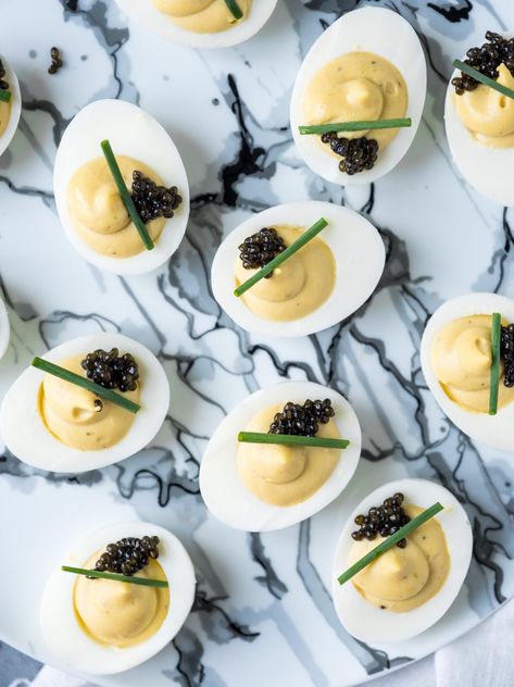 Eclipse Deviled Eggs, Deviled Eggs Martha Stewart, Deviled Eggs Caviar, Appetizers With Caviar, Pretty Deviled Eggs, Deviled Eggs With Caviar, Caviar Deviled Eggs, Curry Deviled Eggs, Creative Deviled Eggs