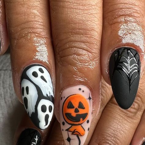 Janette Acosta on Instagram: "🎃 @luxapolish •Citrusly? •Blackout •Whiteout •Shine •Bloom Gel •Velveteen Matte code: nailsbyjanettea 

Inspo @amanda_byrne_nailartist 

#luxapolish #halloween #halloweennails #spookynails #spookyseason #spooky #jackolantern #mattenails #gelx #gelxnails #nailinspo #fall #fallnails" Orange Ghost Nails, Jackolantern Nails, Halloween Nail Designs Jack O Lantern, Spooky Jackolantern, Orange Black White Halloween Nails, Black And Orange Pumpkin Nails, Jackolantern Nail Design, Awesome Nails, Matte Nails