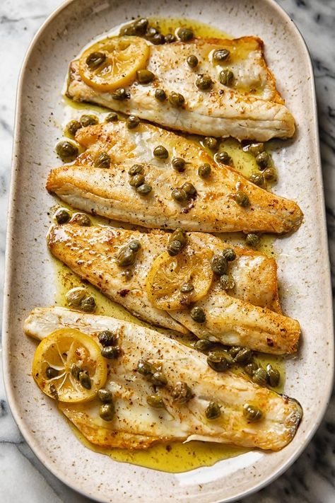 Sea Bass in Brown Butter Caper Sauce Butter Caper Sauce, Healthy Low Calorie Dinner, Parmesan Truffle Fries, Honey Garlic Shrimp, Low Calorie Dinner, Sea Bass Recipes, Capers Recipe, Caper Sauce, Fish Recipes Baked