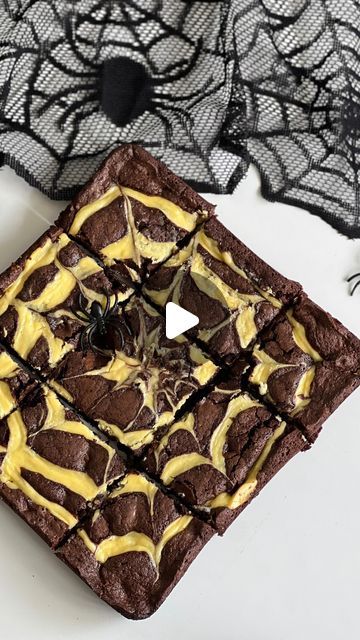 Ashley Lamego ♥ on Instagram: "Spider Web Brownies ✨

2 large eggs 
1/2 cup of butter (melted and cooled) 
3/4 -1 cup of sugar 
1 tsp of vanilla 
1/4 tsp of baking soda 
1/2 cup of all purpose flour 
1/2 cup of unsweetened cocoa powder 
1 cup of chocolate chips 

Cream Cheese Filling: 
1 cup of cream cheese (room temperature)
1 egg yolk 
1 tbsp of flour
3 tbsp of sugqr 

Preheat oven to 350 F 
In a large bowl whisk together butter, sugqr, and vanilla. 
Whisk in egg. 
In a separate bowl combine dry ingredients and slowly add to the wet. 
Fold in the chocolate chips. 
In a separate bowl combine cream cheese, sugar and flour. Mix until smooth and then add in egg yolk. 
Transfer to a piping bag/ a ziplock bag cutting a small hole in the corner of the bag. 
Pour brownie mixture into a greased 9 Spider Web Brownies, Unsweetened Cocoa Powder, Piping Bag, Ziplock Bag, All Purpose Flour, Ziplock Bags, Cream Cheese Filling, Unsweetened Cocoa, Egg Yolk