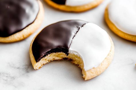 Bakery-Style Black and White Cookies Black And White Cookies Recipe, Black And White Cookie Recipe, White Cookies, Black And White Cookies, White Cookie, White Chocolate Chip Cookies, Vanilla Icing, Famous Recipe, Chocolate Icing