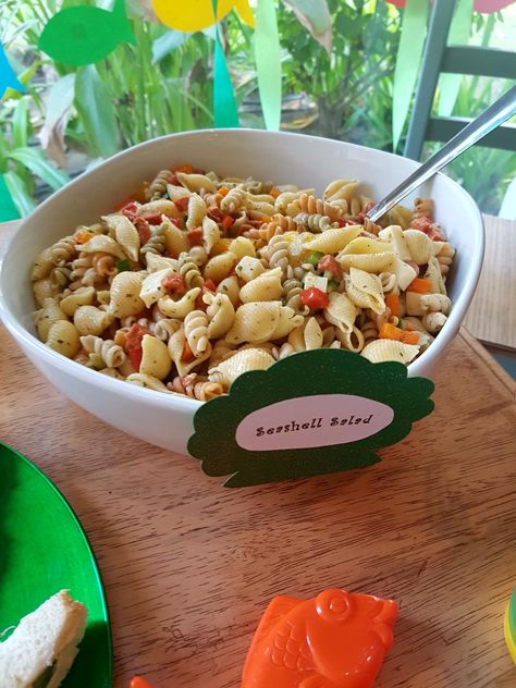 Seashell Pasta Salad Third Birthday Beach Theme, Sea Shell Pasta Salad, Seashell Pasta Salad, Seashell Salad, Ocean Themed Party Food, Pirate Lunch, Seashell Pasta, Mermaid Birthday Party Food, Mermaid Food