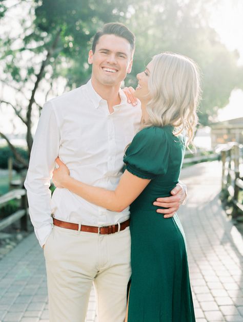 Dark Green Engagement Photos, Engagement Photos Outfits Green, Emerald Green Engagement Photos, Engagement Photos Same Height, Green Dress Engagement Photos, Green Couple Outfit, Green Dress Engagement Pictures, Green Engagement Dress, Green Engagement Photos