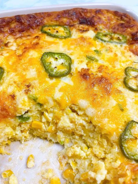 cheesy jalapeno corn casserole easy jiffy recipe hero image baked with scoop removed. Corn Casserole Jiffy Jalapeno, Cornbread Casserole Jalapeno, Best Jalapeño Corn Casserole, Jalapeno Cornbread Casserole, Corn Jalepeno Casserole, Jiffy Corn Casserole With Jalapenos, Cornbread Jalepeno Casserole, Jalapeno Corn Casserole Jiffy, Jiffy Jalapeno Cheddar Cornbread With Cream Corn